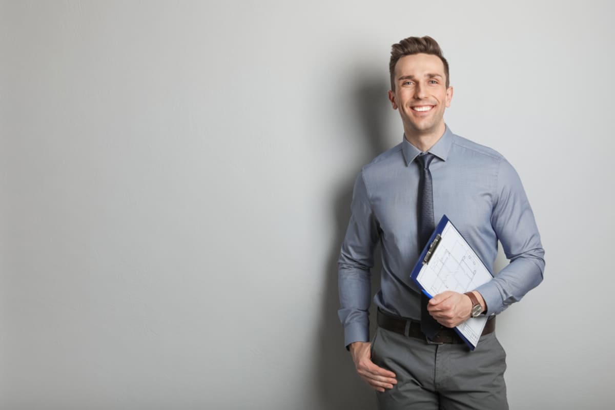 A man with a clipboard