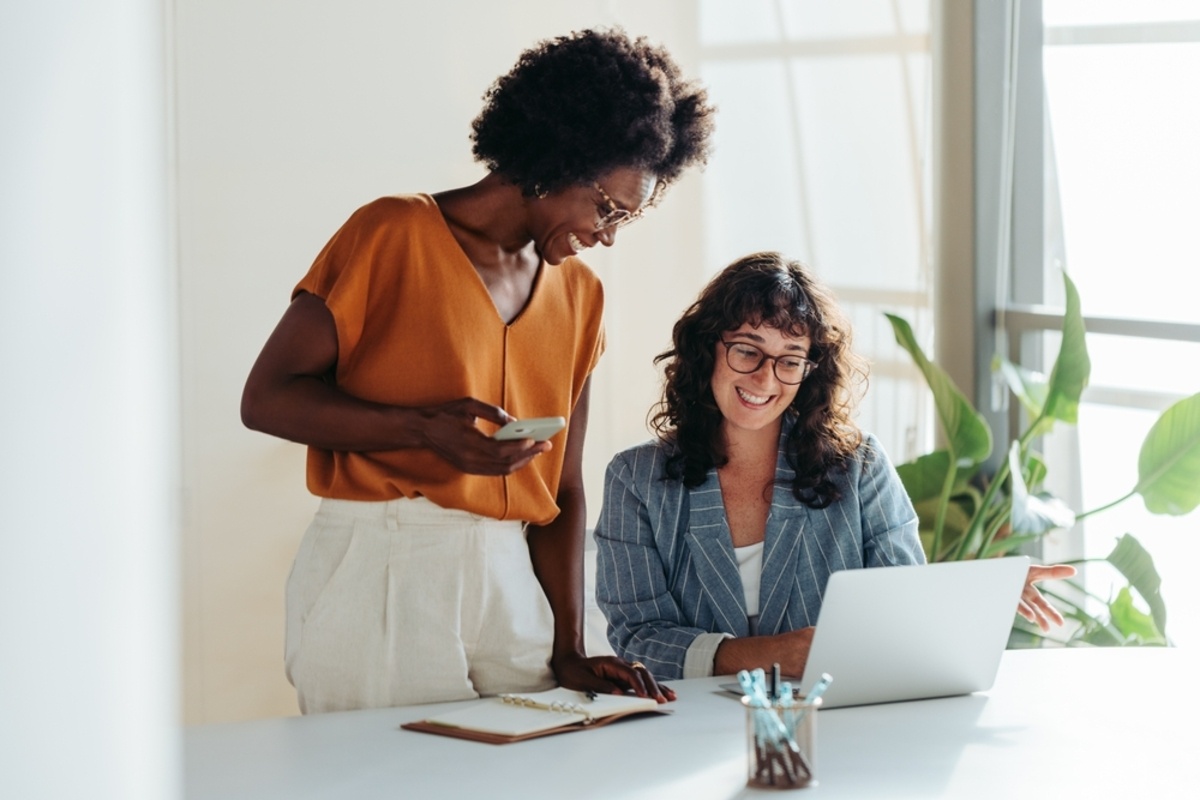 Happy professional women in an office space