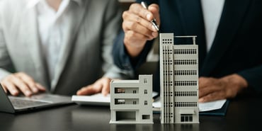  Models of commercial buildings on a desk 