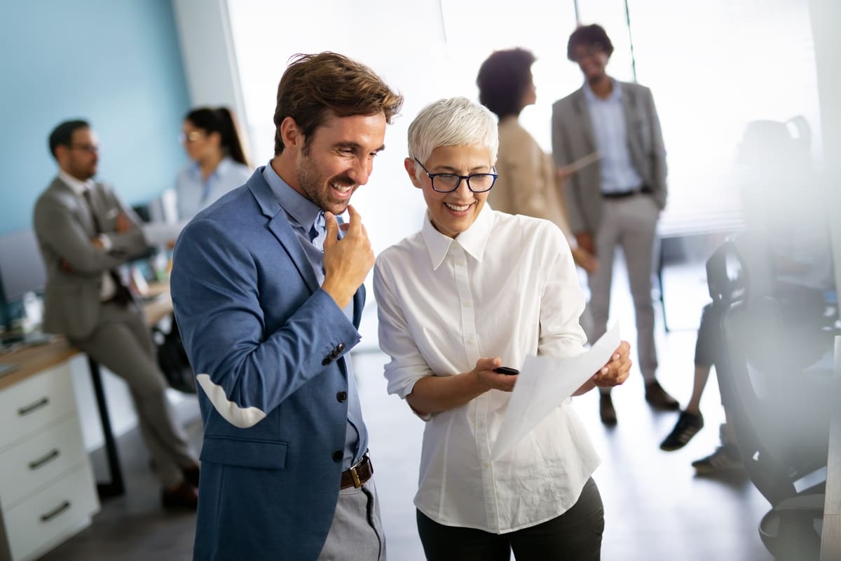 People smiling in an office space