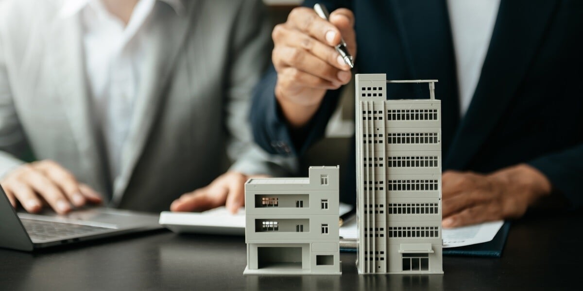 Models of commercial buildings on a desk